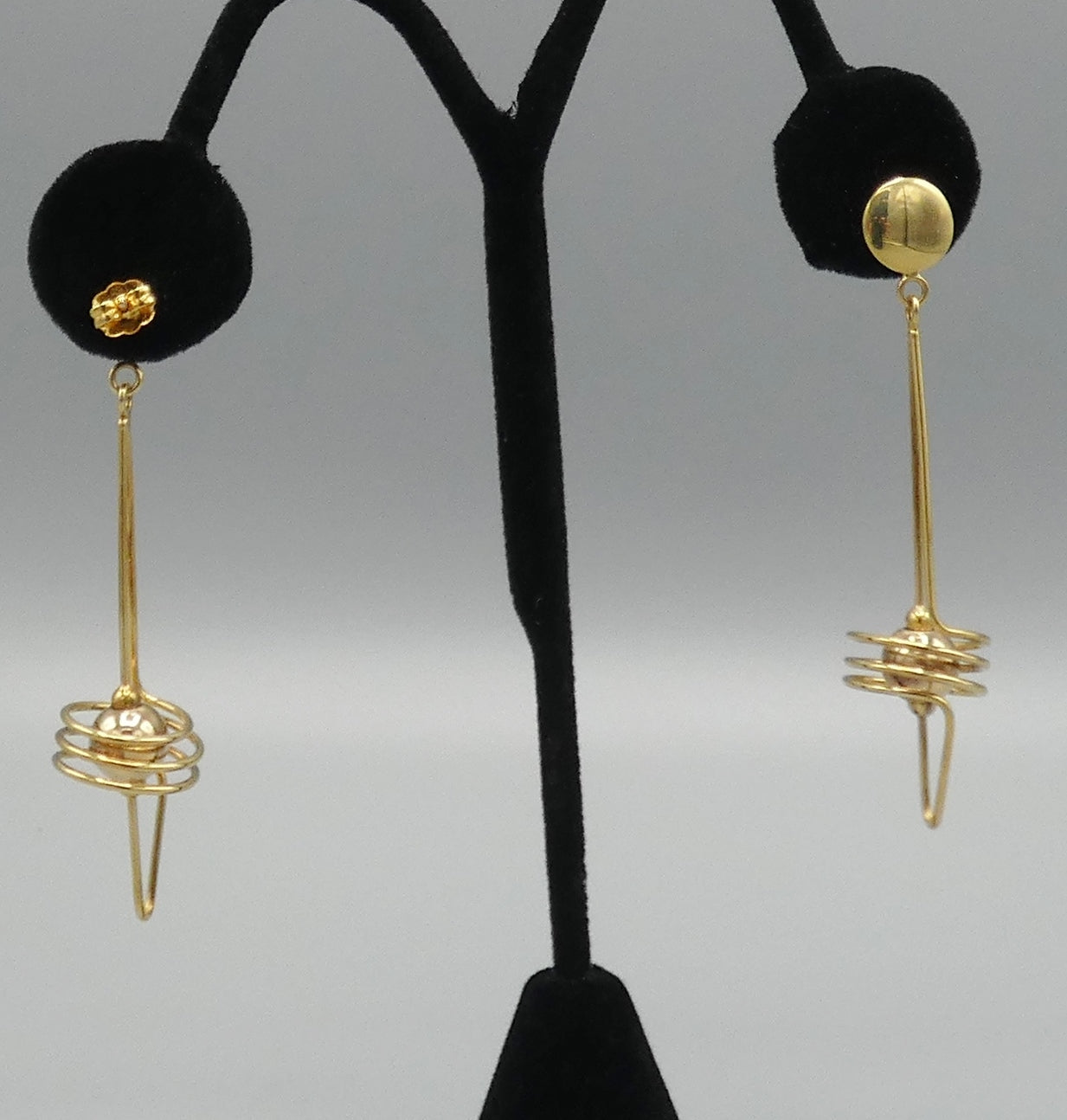 14k Gold long swirl earrings