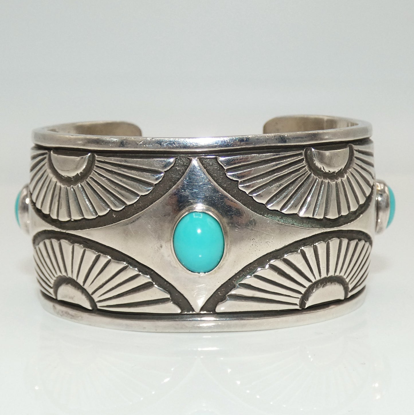 Sterling Southwest Design Heavy Cuff with Turquoise Center