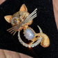 14K Yellow & Gold Winking Cat Brooch with Diamonds and Sapphire