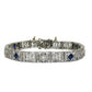 White gold bracelet with blue sapphires and diamonds on on a white background
