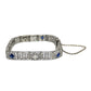 White gold bracelet with blue sapphires and diamonds on on a white background