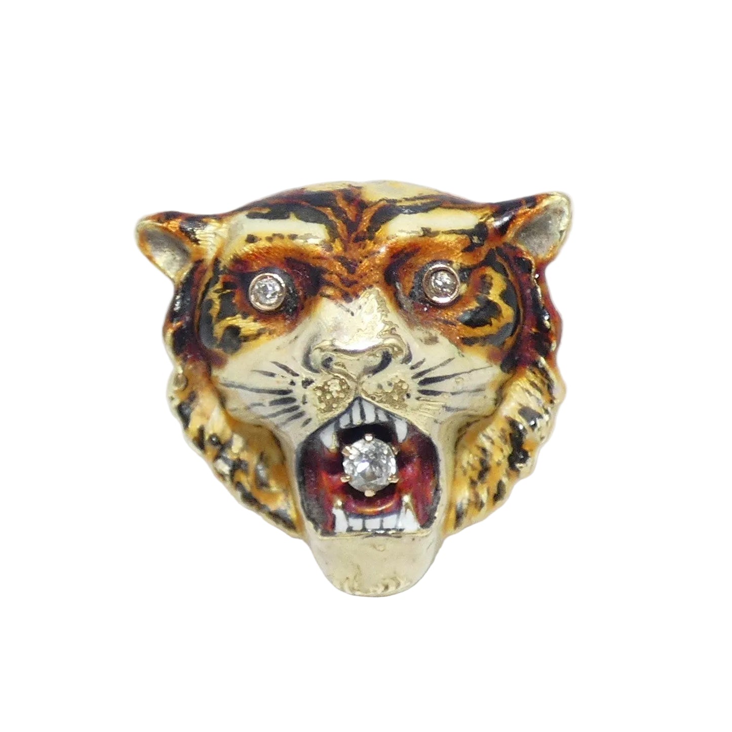 A tiger head brooch pin featuring a gold base with black and brown enamel stripes, a red interior, and diamond set in the eyes and mouth