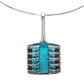 A silver-toned metal pendant necklace featuring a ribbed, cage-like border with a central turquoise blue woven inlay, suspended from a thin silver chain 