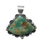 A triangular turquoise pendant with natural brown and orange matrix, set in a silver-toned scalloped bezel with dark inlay
